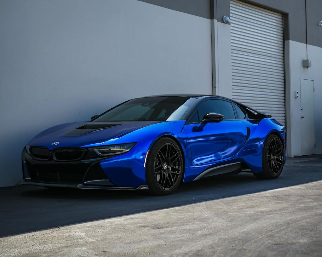 Blue BMW i8 parked at Infinite Auto Works auto protection shop Charlotte & Concord, NC