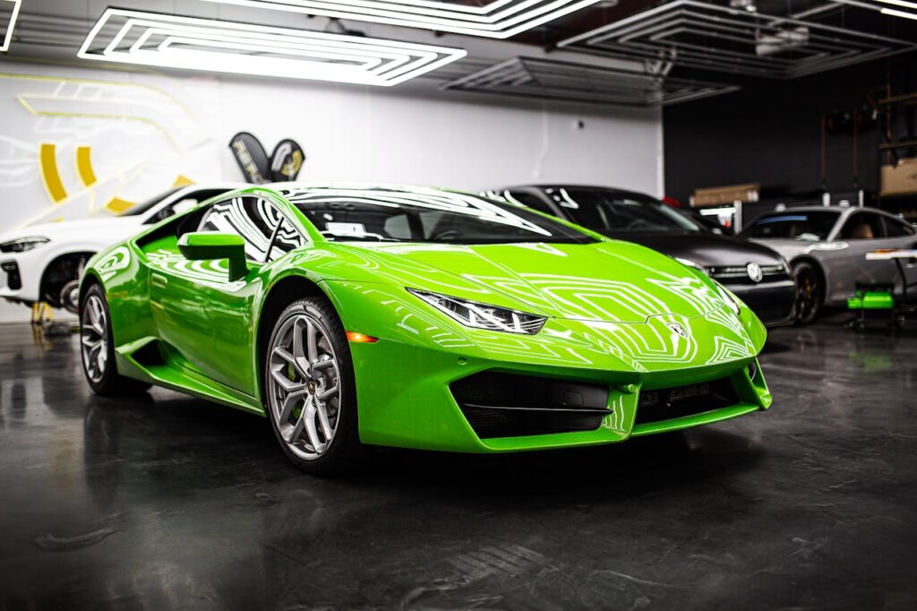 Green Lamborghini Huracán at Infinite Auto Works auto protection shop for Auto Window Tinting in Charlotte and Concord, NC